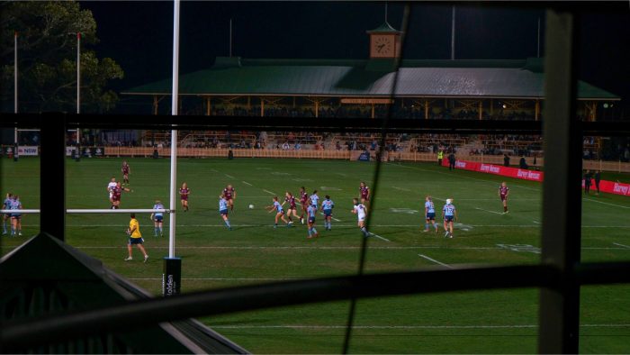 New South Wales player Nita Maynard passes to teammate Talesha Quinn in the first Women's State of Origin match - 22 June 2018, North Sydney Oval.